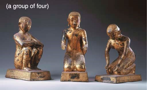 Three Thai Gilt-Lacquered Bronze Adorants Together with A Thai Gilt and Polychromed-Wood Figure of Buddha