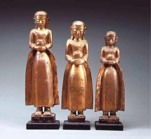 Three Burmese Gilt and Lacquered Wood Buddhist Acolytes