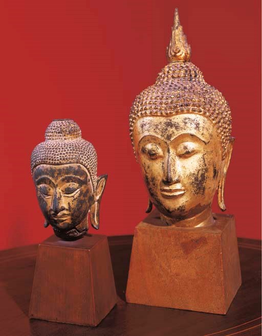 A Thai Gilt-Bronze Head of Buddha and A Smaller Thai Bronze Head of Buddha