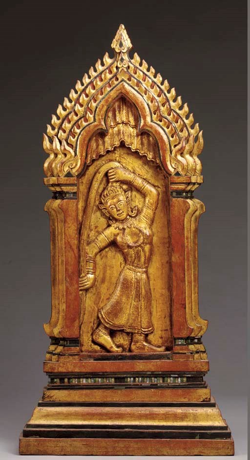 A Thai Polychromed and Gilt-Wood Screen of Phra Torani
