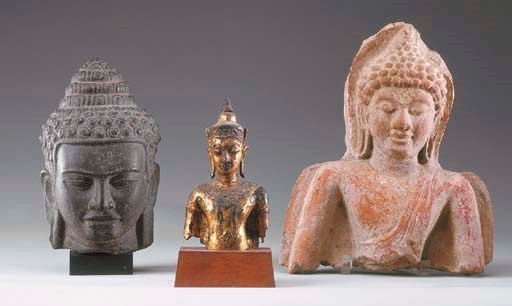 A Thai Gilt-Bronze Torso of Buddha Together with a Thai Stone Head of Buddha and a Thai Terracotta Bust of Buddha
