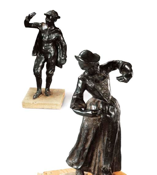 A PAIR OF CONTINENTAL LEAD FIGURES OF PEASANT DANCERS