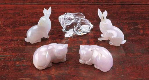 A GROUP OF FOUR CARVED JADE FIGURES OF ANIMALS