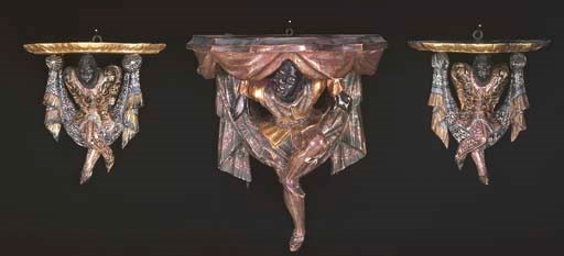 A SET OF THREE ITALIAN POLYCHROME-DECORATED BLACKAMOOR WALL-BRACKETS