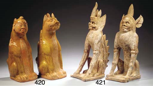 A pair of amber-glazed tomb figures
