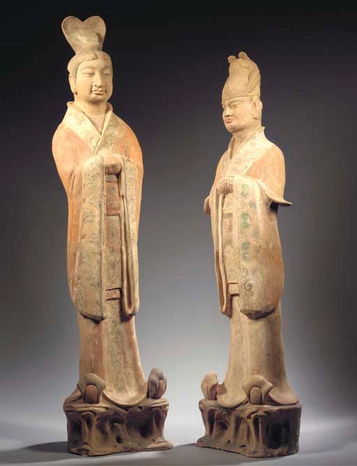 A pair of painted red pottery court officials