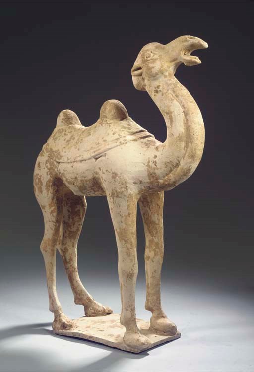 A red pottery figure of a camel