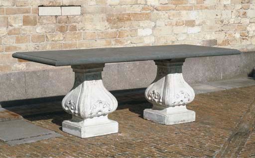 A STONE AND MARBLE GARDEN TABLE