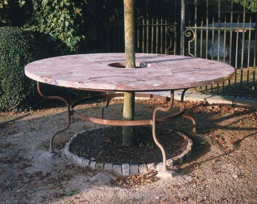 A RED BELGIAN MARBLE AND IRON GARDEN CENTRE TABLE