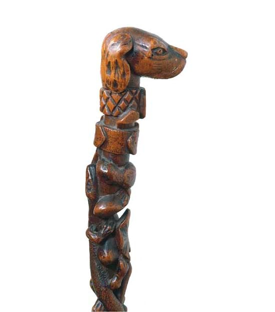 A NORTH EUROPEAN CARVED WOOD WALKING STICK
