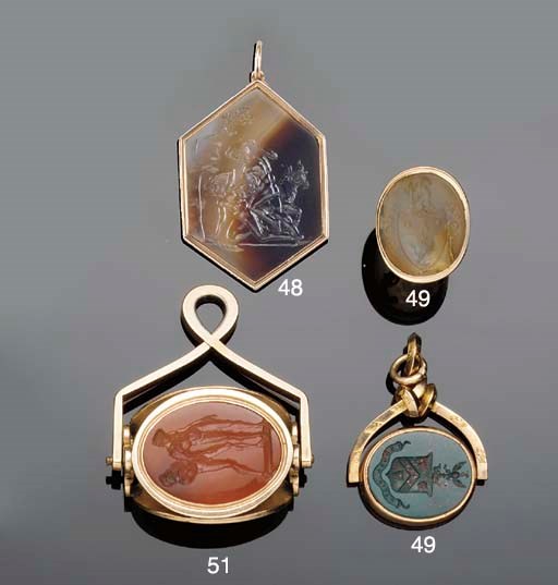 Two 19th century gold-cased hardstone fob seals,