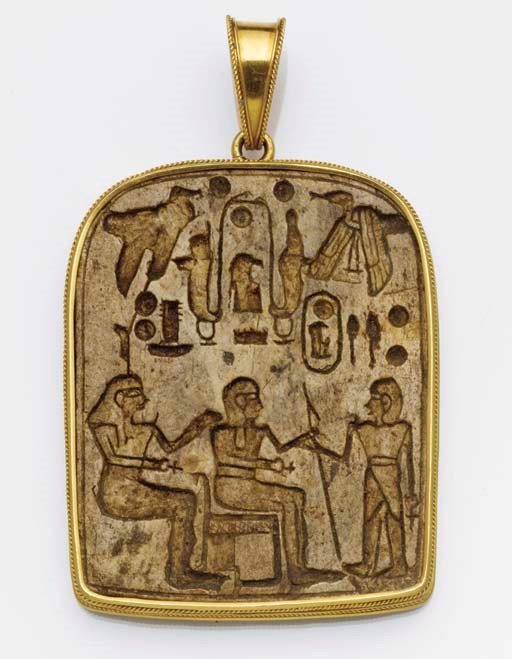 A 19th century gold mounted hardstone pendant