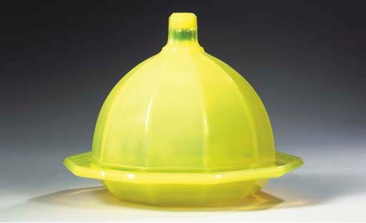 A YELLOW PRESSED GLASS CHEESE STAND