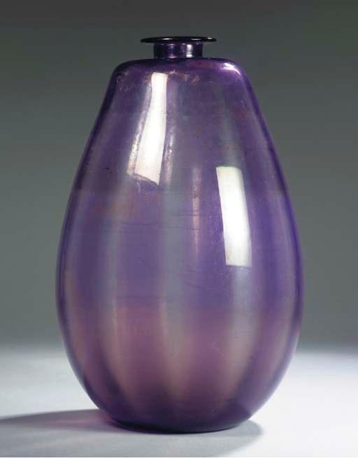 A LARGE PURPLE GLASS VASE
