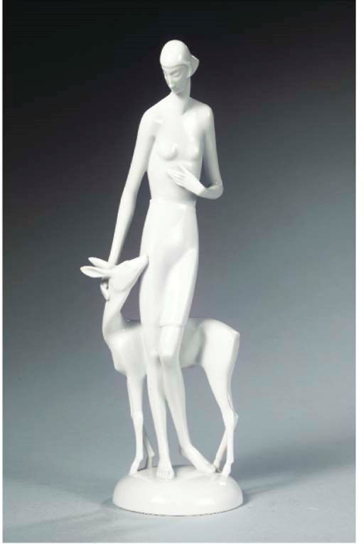 MäRCHEN, A PORCELAIN FIGURE OF A GIRL WITH DEER