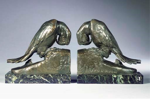 (2)  A PAIR OF GREEN PATINATED METAL BOOKENDS