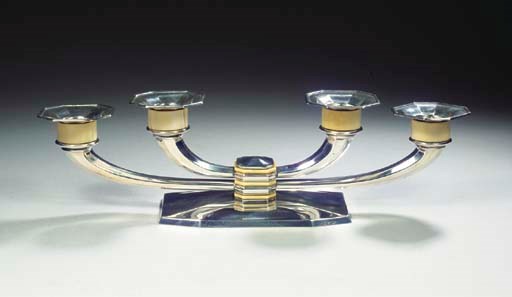 A BELGIAN SILVER AND IVORY CANDELABRA