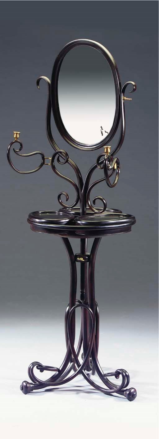 A stained bentwood dressing table