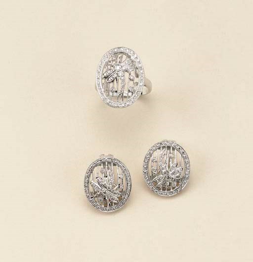 Demi parure in oro bianco e brillanti
