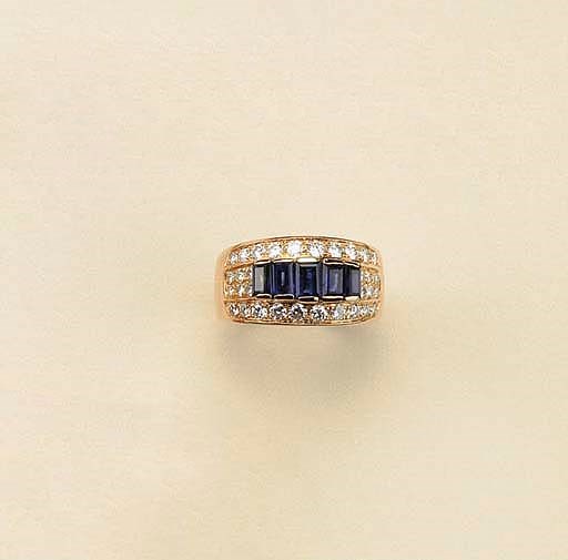 Anello in oro giallo con zaffiri e brillanti