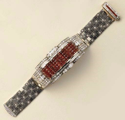 Bracciale in oro bianco, rubini e diamanti