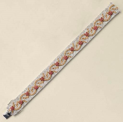 Bracciale in oro con brillanti, rubini e zaffiri gialli