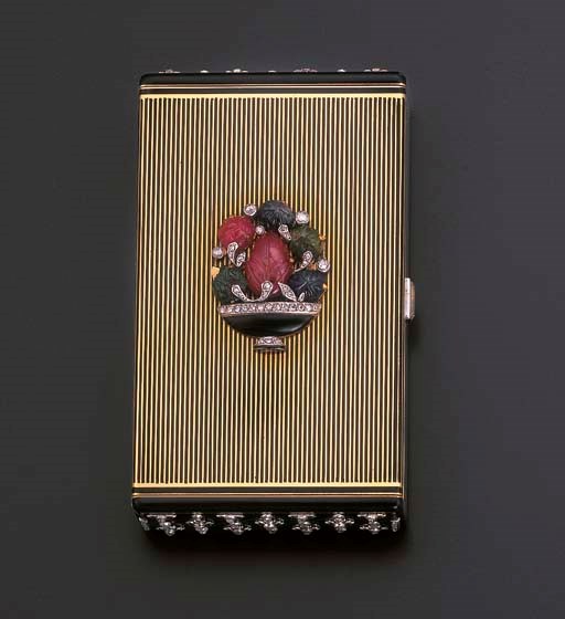 AN ART DECO GEM-SET, DIAMOND AND ENAMEL VANITY CASE, BY CARTIER