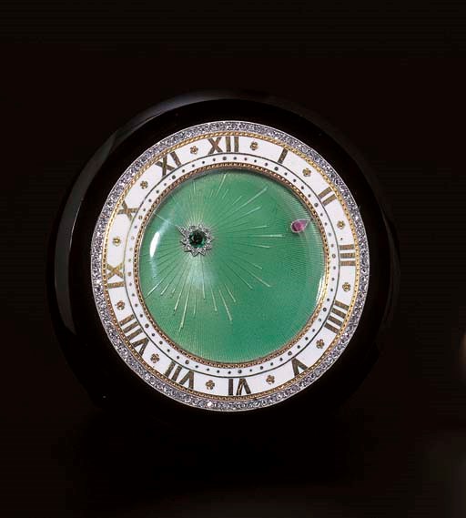 A RARE "COMET" TABLE CLOCK, BY CARTIER