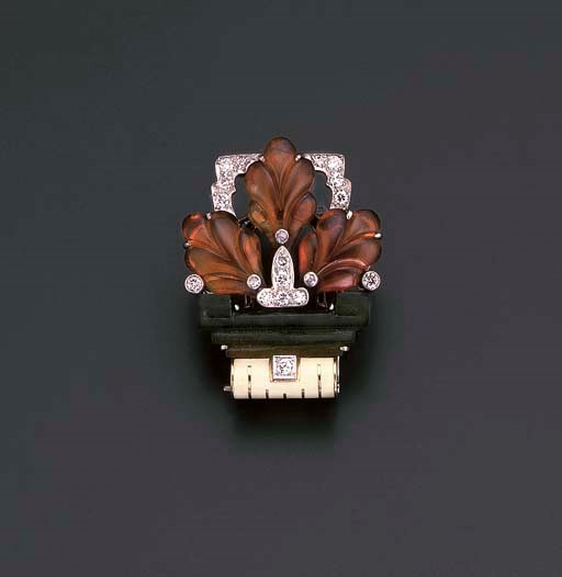 A CITRINE, JADE AND DIAMOND CLIP BROOCH, BY CARTIER