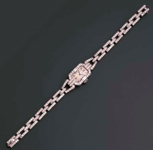 A LADY'S ART DECO DIAMOND WATCH, BY CARTIER