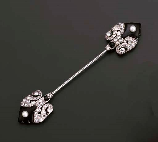 AN ART DECO ONYX, DIAMOND AND PEARL JABOT PIN, BY CARTIER