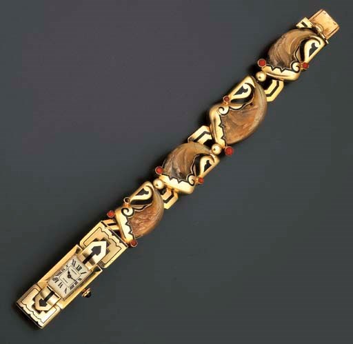 A UNIQUE ENAMEL, CORAL AND TIGER'S CLAW LADY'S WATCH, BY CARTIER