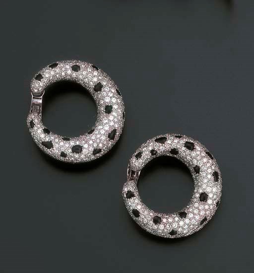 A PAIR OF DIAMOND AND ONYX PANTHER EARCLIPS, BY CARTIER