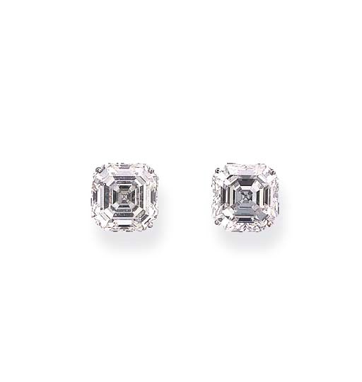 A PAIR OF DIAMOND SINGLE-STONE EARRINGS