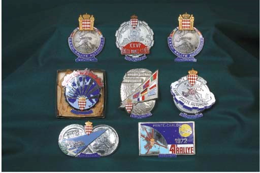 Monte Carlo Rally - A group of competitors finishing-award badges including years 1956 (26th), 1958 (28th) 1959 (29th) x2, 1962 (32nd) x2, 1963 (33rd x2) 1967 (37th), 1968 (38th) & 1972 (41st) ;various conditions.  (11) 	 (11)