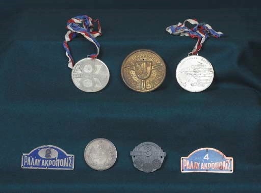 Acropolis Rally - Two aluminium personal competitors lapel badges and a Silver Medal award (2nd in Class); together with competitors award badges & medals for the CSSR Rallye Ultava 1966 (x2); Geneva International Rallye, Stadt Rallye International, Munich-Vienna-Budapest 1966. 	 (7)