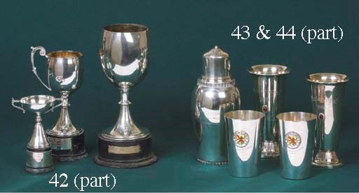 A silver-plated cocktail shaker; inscribed "A-B E Fleron Hederspreis - Skanerunden 1955"; together with a pair of silver beakers having applied KNA enamelled silver badges to front inscribed "Winterloppet 1961 - 5pr & 4pr - Kl1" respectively; and with a silver vase, inscribed & dated 1958. 	 (4)