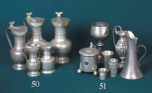 Rallye International de Geneve; Three large pewter trophies in the form of wine-servers variously inscribed  'Conseil Generale' and 'Conseil d'Etat Republique' and 'Canton Geneve'; 1962, 1963 & 1964  and with two others: one uninscribed. 	 (5)