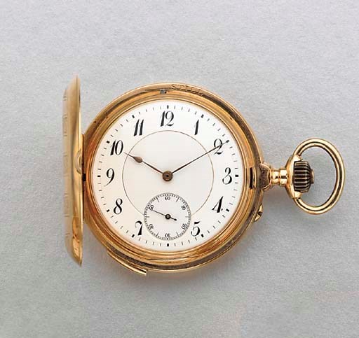 Swiss. A 14K gold hunter case two train minute repeating grande sonnerie keyless lever watch