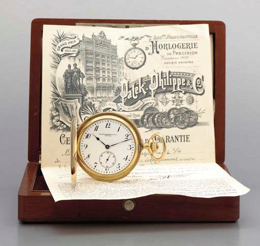 Patek Philippe. A fine 18K gold hunter case quarter repeating keyless lever watch