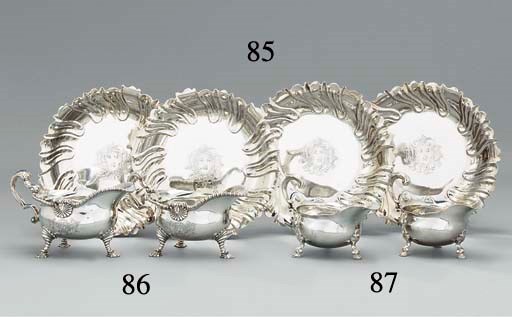 A pair of George II silver sauce-boats