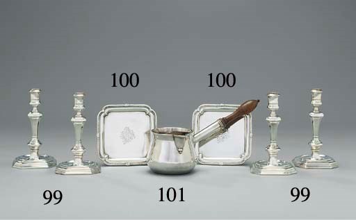 A pair of George II silver waiters