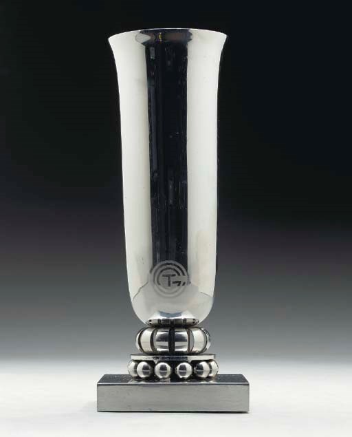 A chrome plated silver vase for the French Line