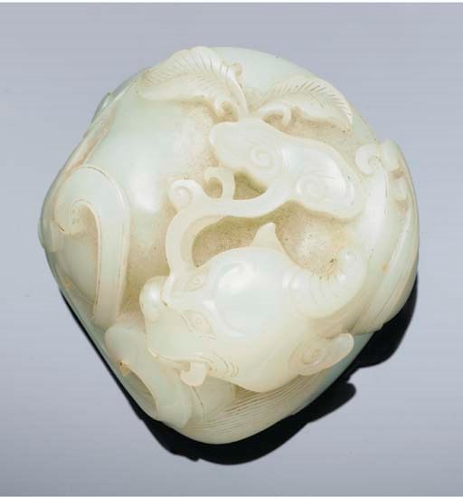 A white jade carving of a qilong, 18th century