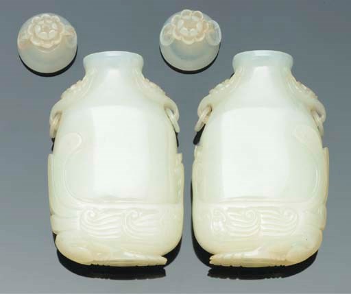 A pair of miniature white jade vases and covers, 19th/20th Century