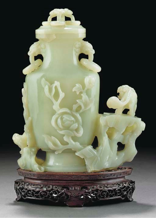 A celadon jade vase and cover, 18/19th century