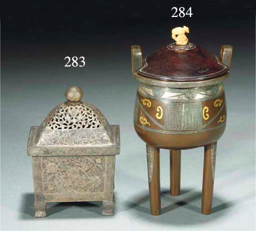 A bronze tripod censer inlaid with gold and silver, 18th/19th century