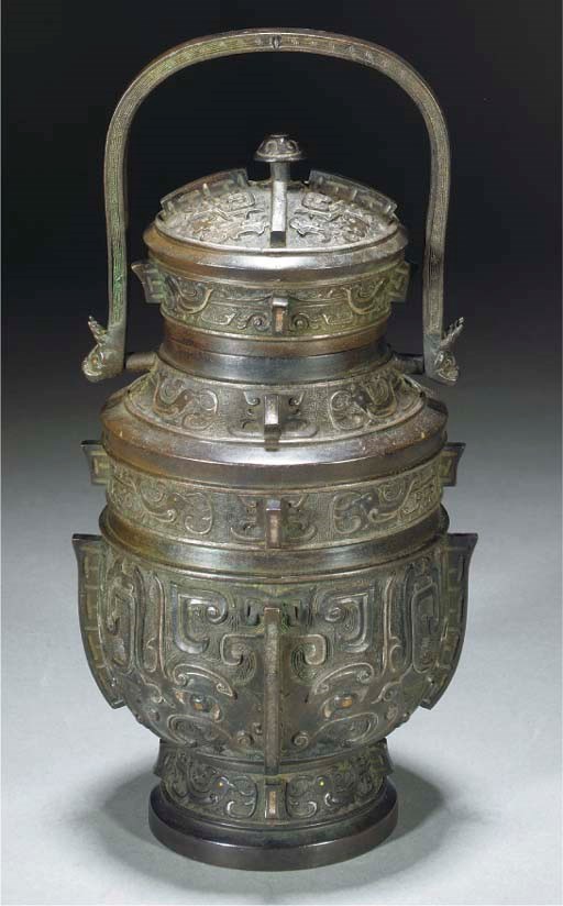 A bronze gold and silver inlaid archaic style jar and cover, 18th century