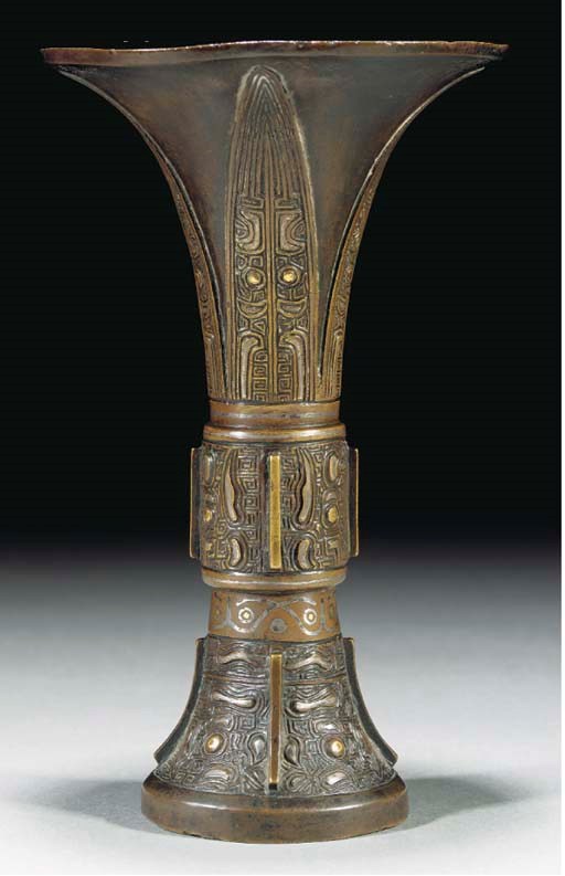 A bronze gu vase inlaid with gold and silver, Late Ming Dynasty
