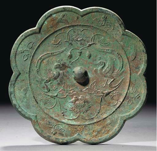 A large silvered bronze floriform mirror, Tang Dynasty